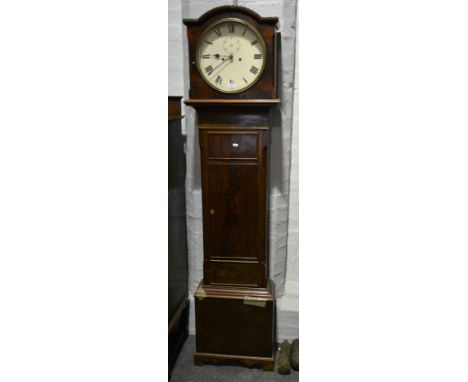 Mahogany longcase clock. arched hood with a gadrooned frieze, long door with gadrooned quarter columns, bracket feet, 13" cir