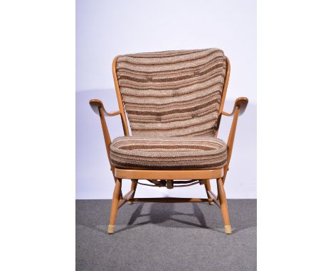 Ercol beech armchair, spindle-back, shaped arms, turned splayed legs joined by rails, loose cushions, width 73cm, height 83cm
