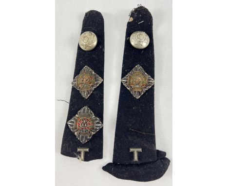 A pair of epaulettes with bullion and embroidered shoulder pips and buttons. 