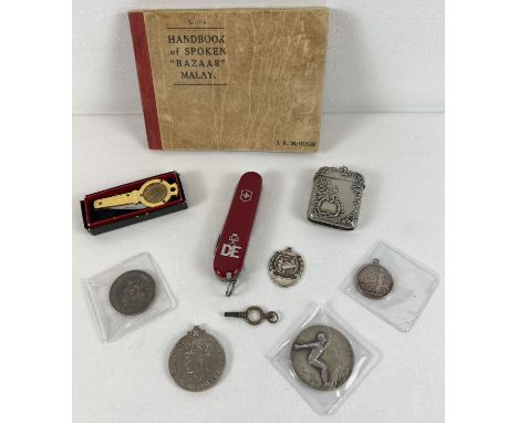 A small collection of vintage misc items. To include Duke Of Edinburgh Swiss Army Penknife, sports and commemorative medallio