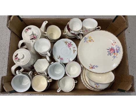 A box of assorted vintage ceramic tea ware. To include tea pots and cups &amp; saucers in varying floral designs. 