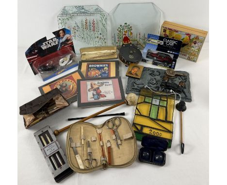 A box of mixed misc items. To include: painted glass panels, Star wars boxed diecast cars, vintage manicure sets, stained gla