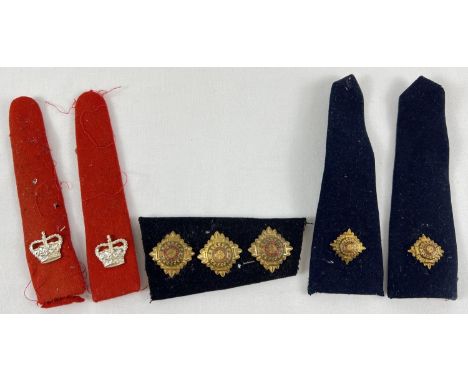 2 pairs of shoulder epaulettes with pips together with a part strap containing 3 shoulder pips. 