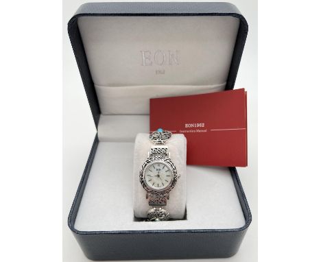 A boxed, new with original packaging, Eon 1962 ladies Arizona Sleeping Beauty 925 silver wristwatch. Oval panel bracelet stra