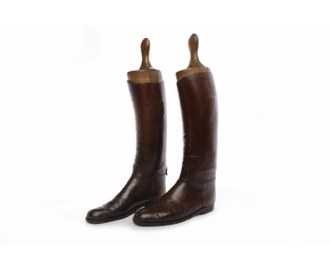 PAIR OF 20TH CENTURY TAN LEATHER RIDING BOOTS with wooden trees with carved 'R' and 'L', boots worn, from heel 47cm high