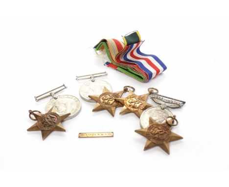 COLLECTION OF WWII MEDALS to include The Defence Medal, The 1939-45 War Medal, The 1939-45 Star, The Italy Star, The Africa S