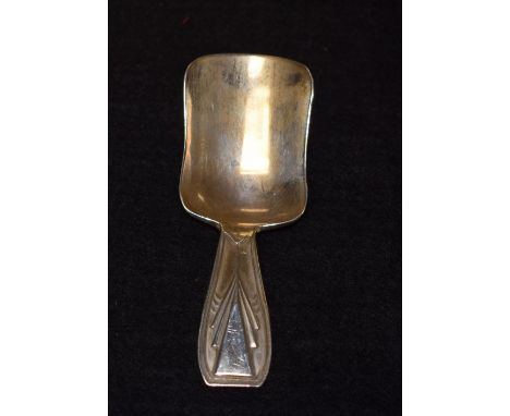 A silver Art Deco caddy spoon with geometric decoration, Sheffield hallmarks