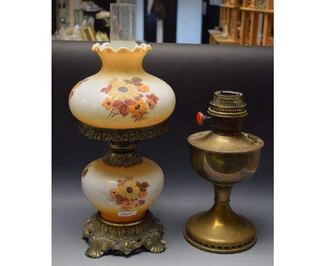Oil lamps - a brass oil lamp; a floral decorated oil lamp in autumn tones (2)