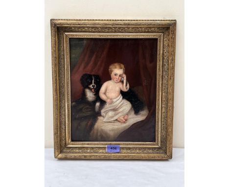 A gilt framed oleograph, young boy with dog. 12' x 10'