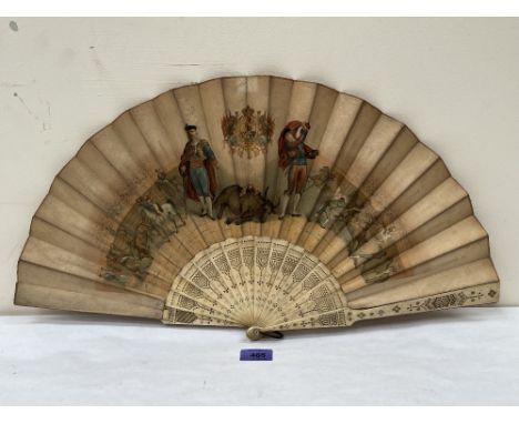 A 19th century lady's fan with bone sticks, the leaf printed with two matadors and bull fighting scenes. 24' wide. Guard stic