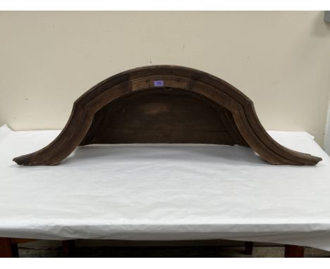 An oak architectural arched canopy. 52'w x 16'h