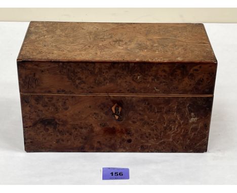 A Victorian burrwood tea caddy with a pair of cut glass caddies. Stoppers associated and bowl lacking. 10½' wide