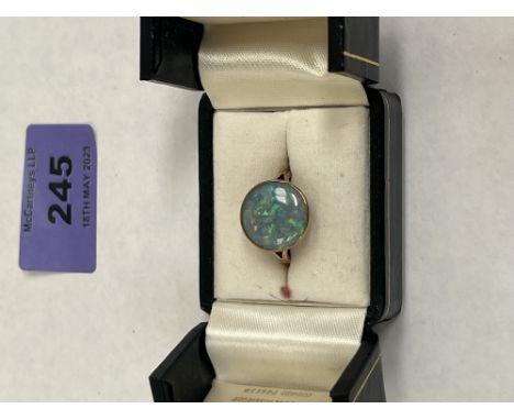 An opal dress ring. In gold marked 375. 5g gross. Size P