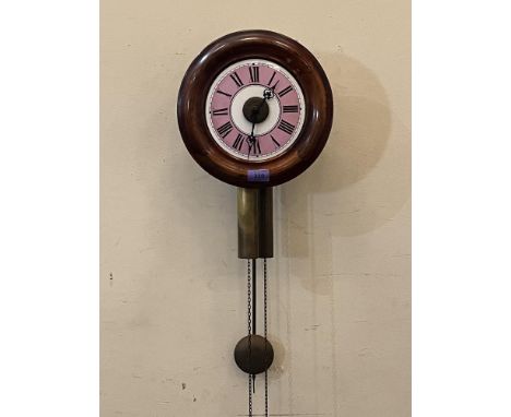 A late 19th century postman's alarm clock. 11' diam