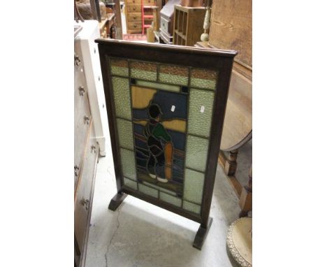 1930's/40's Oak framed firescreen inset with leaded coloured glass panels depicting a Dutch boy