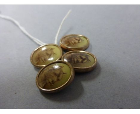 Pair of vintage yellow metal cufflink's with terrier dog decorated panels