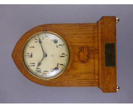 American (W S Gilbert) chiming oak arched case mantle clock with blank presentation plate