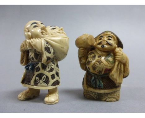 Two netsuke style carvings including Man with hammer & sack and man with head/man in sack