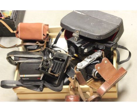Collection of vintage cameras including Zennit