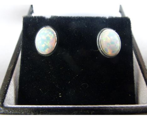 Pair of Silver & Opal stud earrings