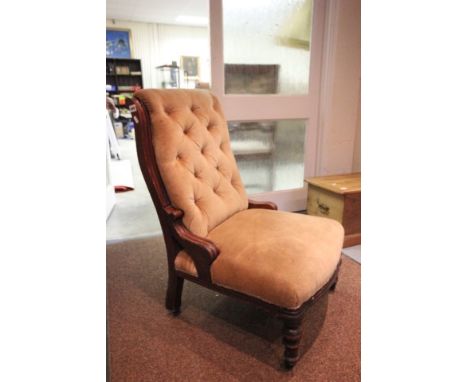 Victorian Mahogany Open Armchair on brass and ceramic castors