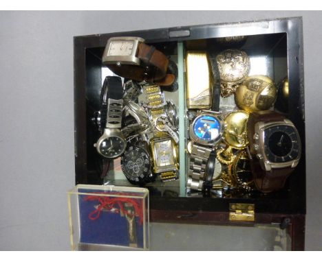 Small glazed table top display cabinet with mixed wristwatches, pocket watches & lighter