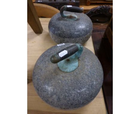 Pair of vintage grey granite curling stones both with wooden & metal handles, 26cm diameter