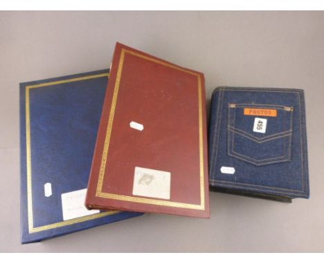 Quantity of vintage postcards in three albums including colour & black & white