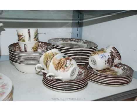 A quantity of Royal Worcester Palissy Game Series china including cups, saucers, dinner plates, tea plates, bowls, etc