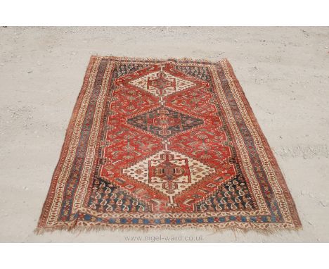 A vintage Persian rectangular Rug with three medallions and multiple borders, some light damage, 46" wide x 78" long