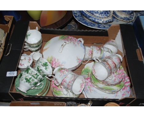 A quantity of Royal Albert 'Blossom Time' china including cups, saucers, plates, two bread and butter plates, a vegetable dis