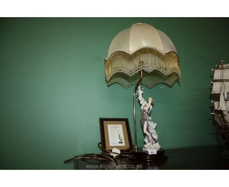 A 'Silver Moon' sculpture Table Lamp by Florence with certificate and beaded shade