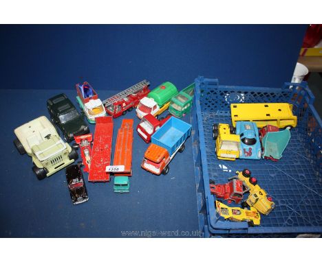 A quantity of Corgi toy Cars and vans including Range Rover, Loines,, Fire engine etc and a small Tonka trailer and cab