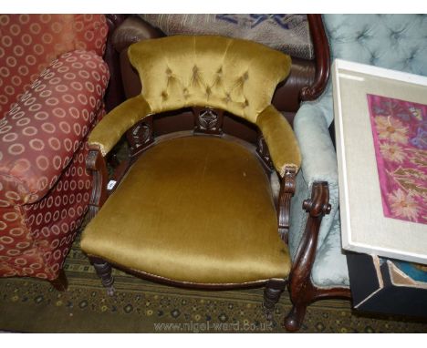A 19th c. tub Armchair; button padded back on three fret cut supports on turned legs.