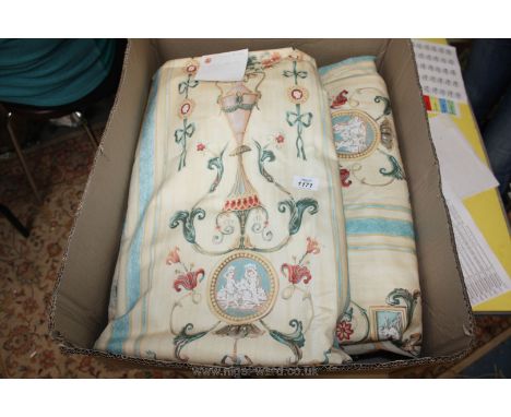 A pair of turquoise and white Curtains and another curtain