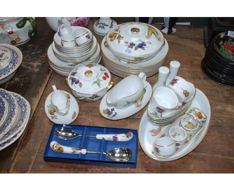 A quantity of Royal Worcester 'Evesham' Dinnerware including dinner plates, vegetable dishes and lids, gravy boat and saucer,