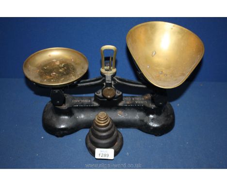 A set of brass Scales by Libra Scale Co; England and eight Imperial weights