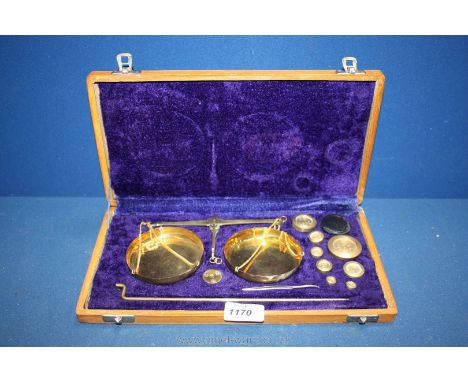A cased set of jewellery Scales and gram weights