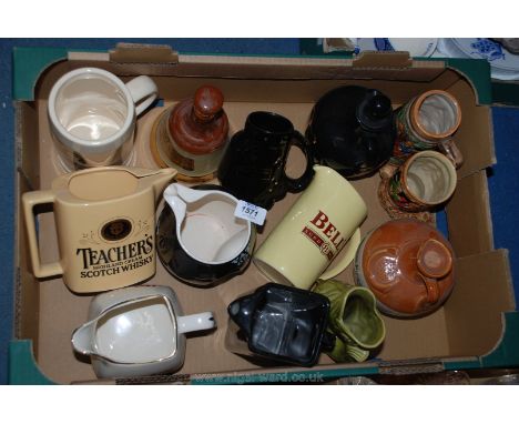 A quantity of water jugs including Vat 69, Bells Scotch Whisky, Stella Artois, Bells, etc