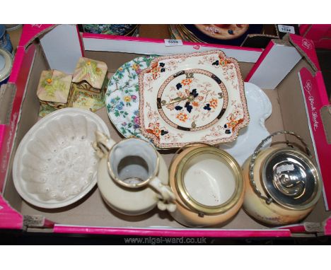 A quantity of china to include Carlton Ware biscuit barrel, jelly mould, clock, etc