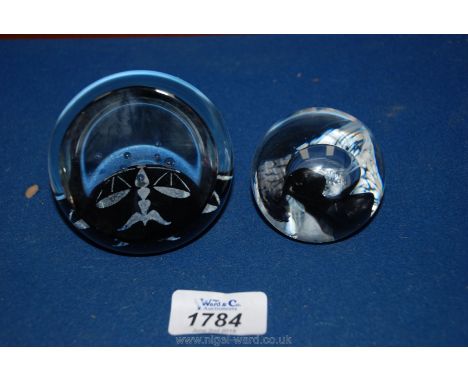 Two glass paperweights including a Caithness Libra limited edition 84/1500 and a Caithness moon crystal paperweight