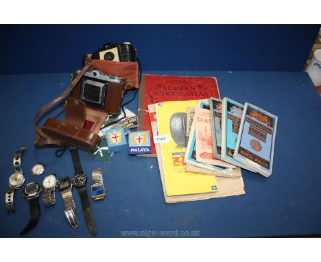 A quantity of miscellanea including nine old maps (some Ordnance Survey, atlas, two cameras, a Kodak Brownie 127 in original 