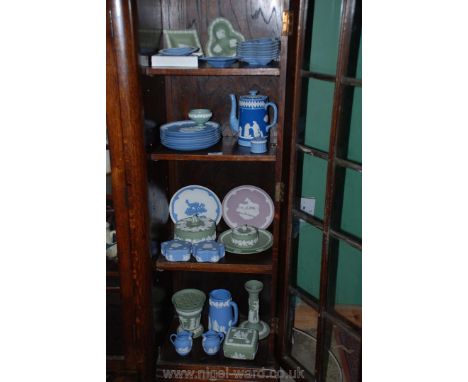 A quantity of Wedgwood china to include blue pin dishes, plates, jugs, coffee pots and a collection of sage coloured Wedgwood