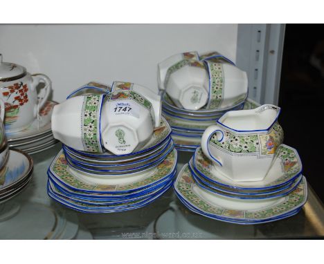 A Royal Doulton reg 732173 part Teaset including eight cups, eleven saucers, twelve tea plates, two bread and butter plates a
