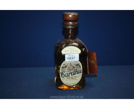 A bottle of twelve year old Cardhu single malt Highland Scotch Whisky