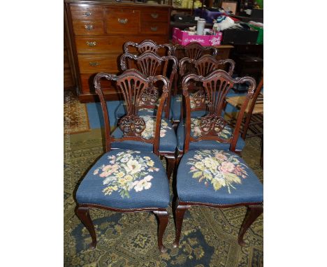 A set of six art nouveau Dining Chairs, having shaped top rail, pieced fret-cut splats, blue ground tapestry seats, standing 