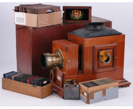 A Victorian mahogany and brass mounted magic lantern,
by Sands Hunter & Co., of London, base length 18", height including chi