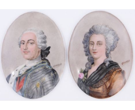 A pair of Limoges oval painted portrait plaques,
signed Garnier,height 3.75".