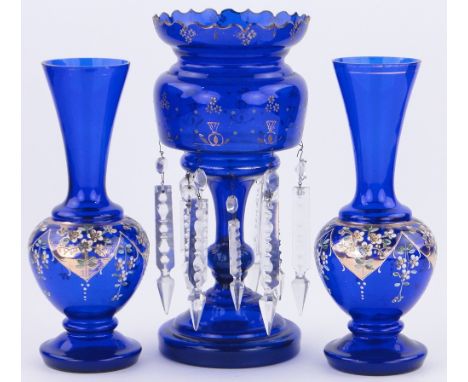 A Victorian Bristol Blue glass table lustre,
with cut-glass arrow head drops, height 12.5" and a pair of Bohemian blue and gi