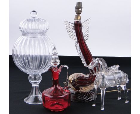 A Murano glass fish lamp,
18", glass bon bon jar and cover, a Cranberry glass jug and stopper and a glass horse, (4).